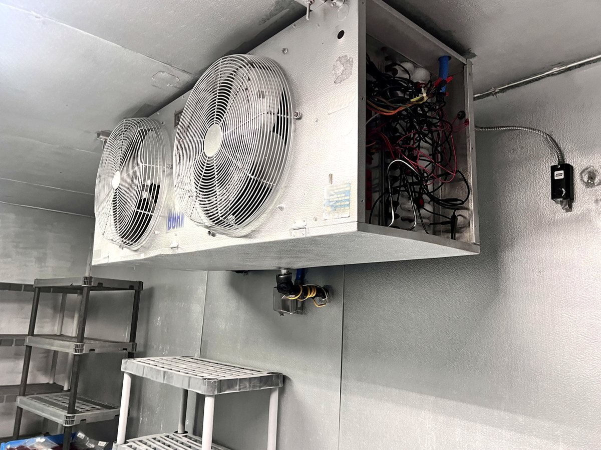 Servicing a walk-in freezer evaporator