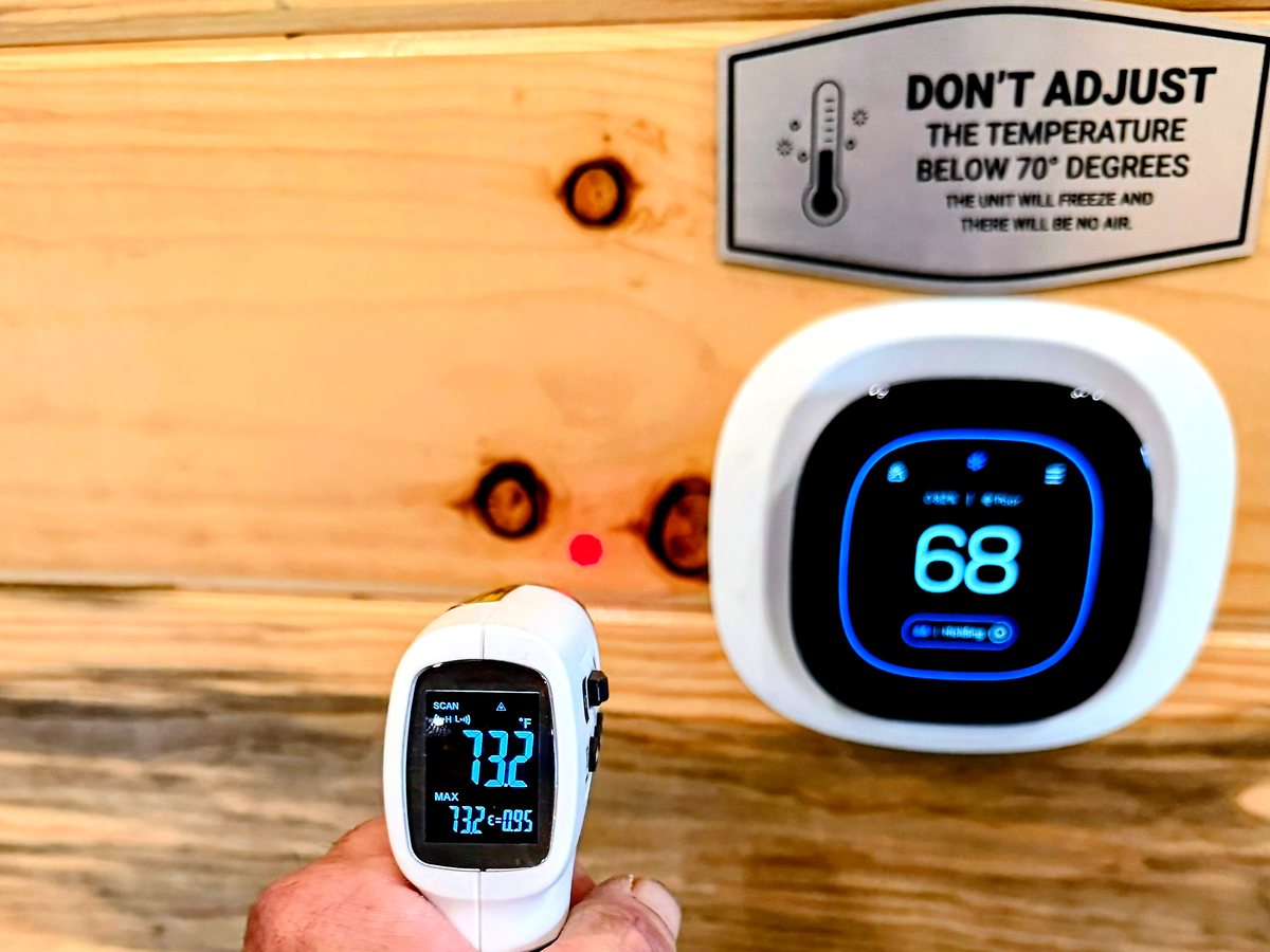 Infrared check by the cabin do-not-adjust thermostat sign